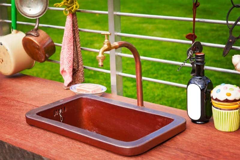 Beautiful Outdoor Cooper Kitchen Sink With Wood Counter