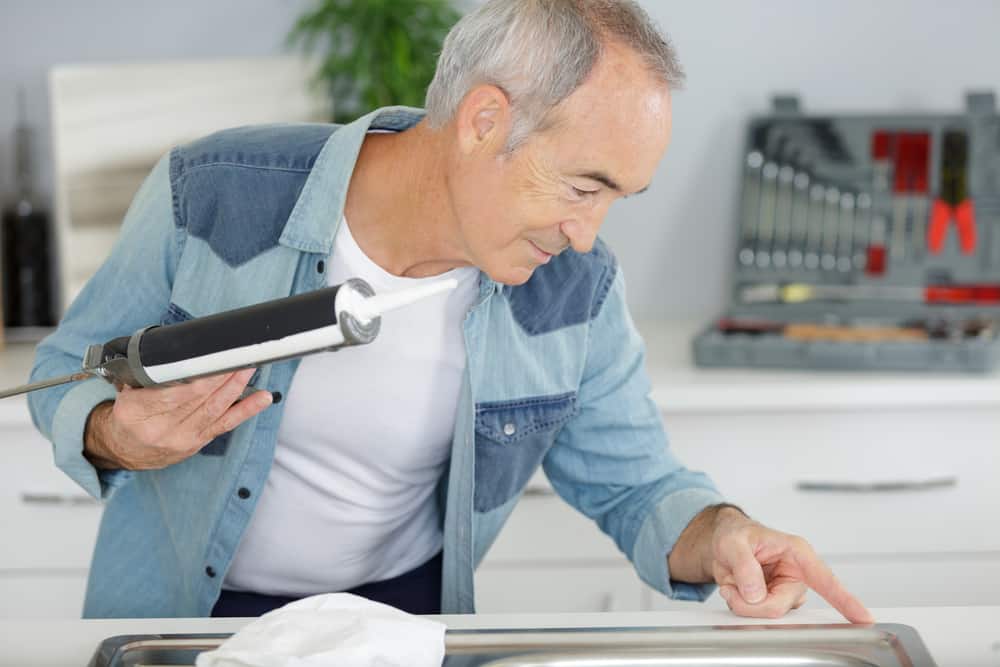 seal the edges of a kitchen sink
