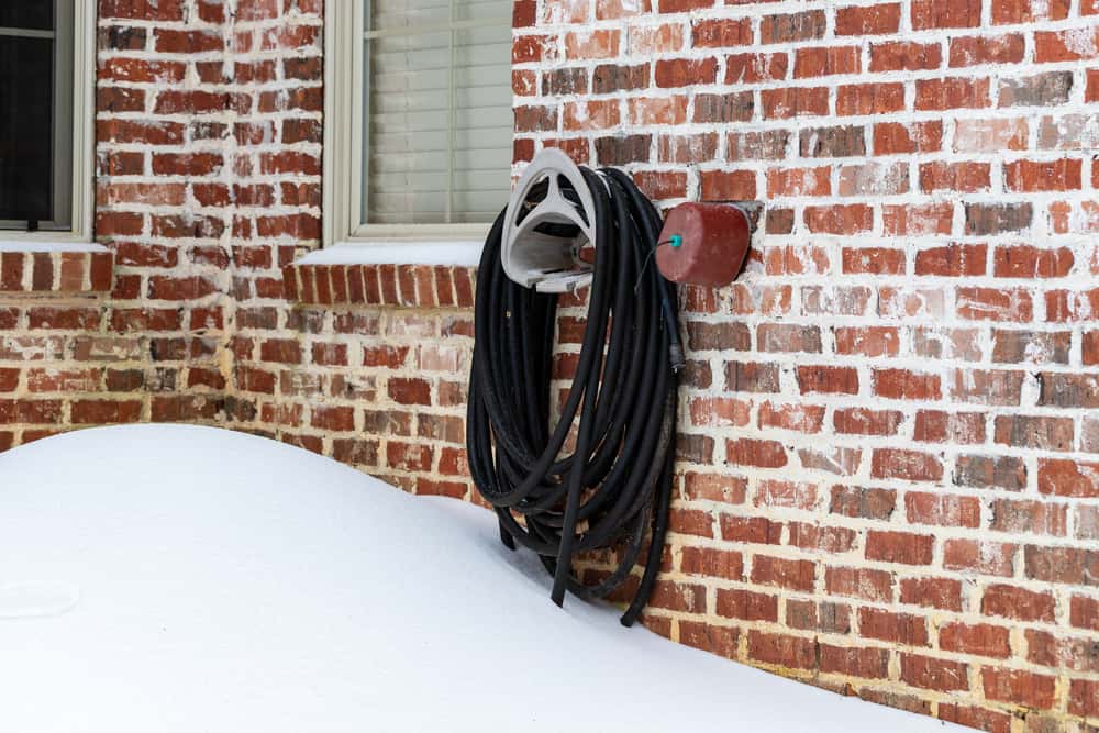 Outdoor Faucet and Hose Winter