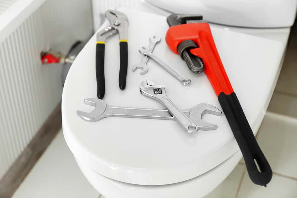Plumbing Tools on Toilet