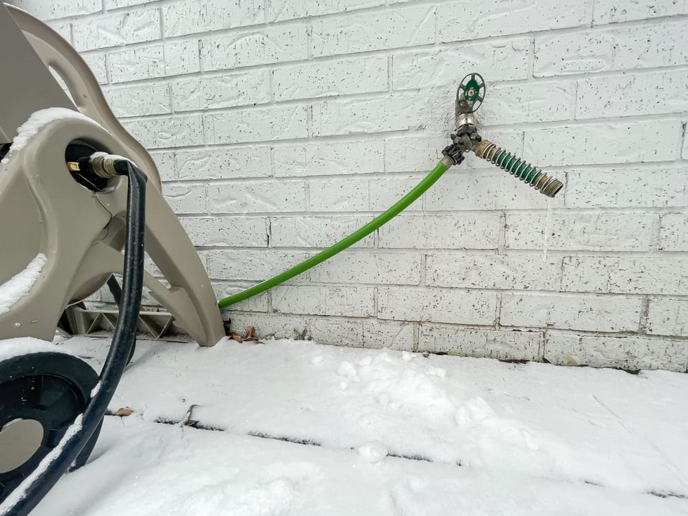 Frozen Outdoor Faucet and Hose